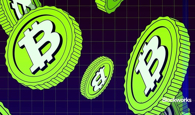 Bitcoin hits new all-time high above 9,000