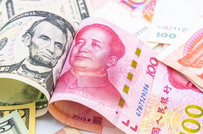 China’s Yuan Slides as Dollar Demand Spikes