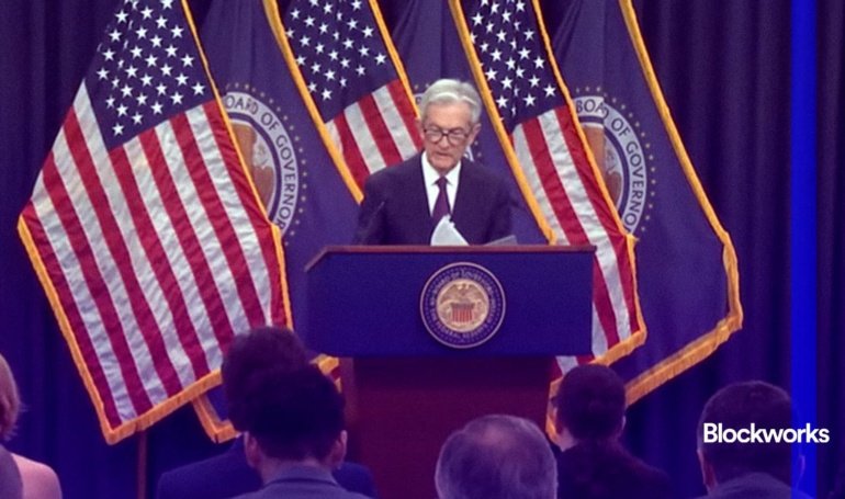 Fed leaves rates unchanged, increases inflation projections