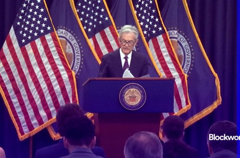 Fed leaves rates unchanged, increases inflation projections