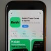 FILE - An ad for the prediction market app Kalshi is displayed on a mobile phone on April 16, 2026, in Chicago. (AP Photo/Erin Hooley, File)